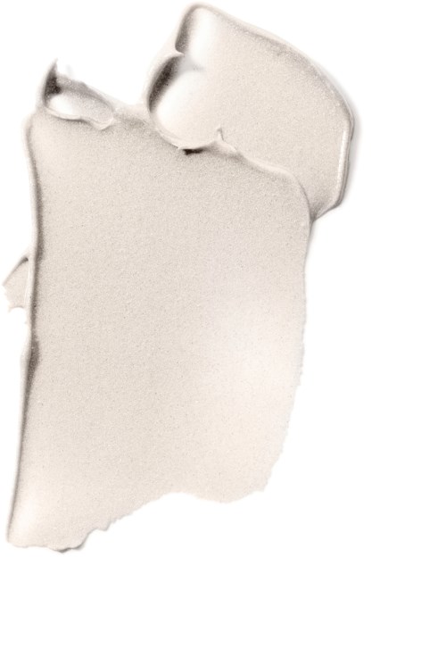 Ein Klecks weiße Creme oder Lotion auf weißem Hintergrund. Keine weiteren Objekte sichtbar.