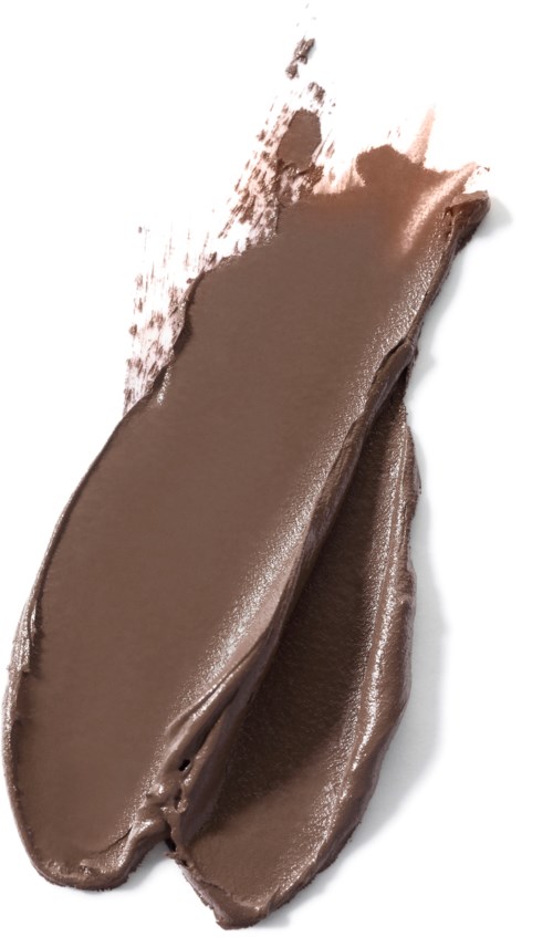 Ein Klecks braune Kosmetik- oder Make-up-Produkten auf weißem Hintergrund.