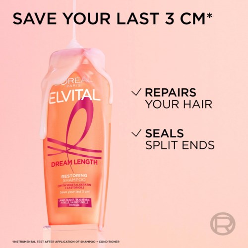 Eine rosa Shampoo-Flasche mit Elvital Dream Length Restoring Shampoo, Text über Haarreparatur und Splitterschutz.