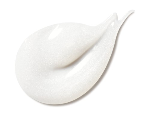 Eine weiße Creme oder Lotion mit einer strukturierten, leicht schimmernden Oberfläche, in Tropfenform mit spitzem Ende.