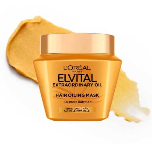 Aflangt krukke med L'Oréal Elvital Extraordinary Hair Oil Mask med gyldent låg og beige creme bagved.