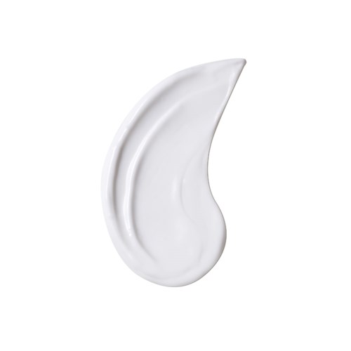 En vit, kurvig klick av creme eller lotion på en enkel bakgrund.