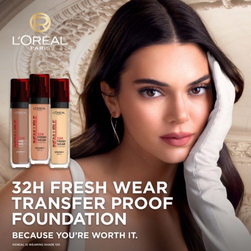 A woman wears makeup and a white glove, with three bottles of L'Oreal foundation on the side. The text promotes long-lasting foundation.