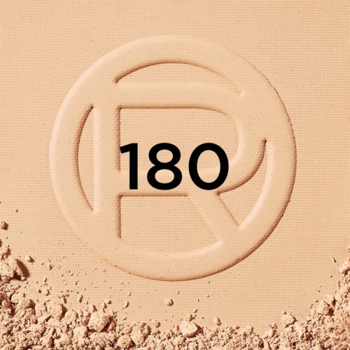 A circular logo with the number 180 in the center on a sandy background.