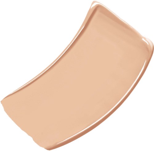 En beige, böjd sminksvamp med mjuk textur och något mörkare kant.
