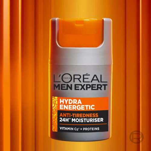 En vit flaska med orange etikett för mäns fuktighetskräm, märkt 'L'Oréal Men Expert Hydra Energetic Anti-Tiredness, 24 timmar.'