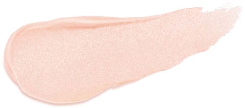 Ett mjukt rosa makeup-produkt, möjligen foundation eller concealer, utspritt i en borstliknande form.
