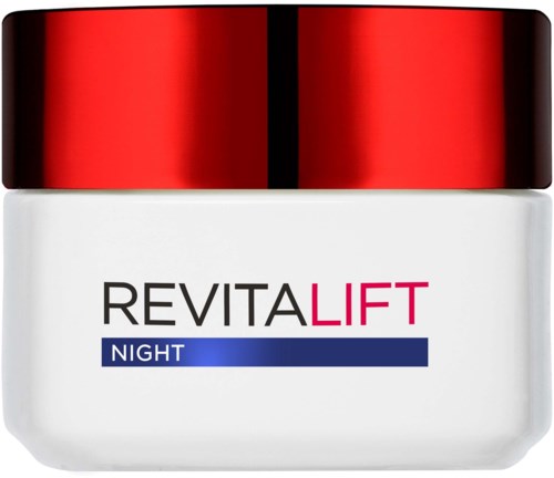 En vit burk med röd lock, märkt 'Revitalift Night' för en hudvårdsprodukt.