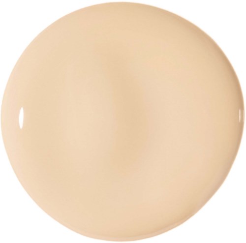 Ett stort, slätt, beige sfäriskt föremål, troligen en boll eller ett dekorativt föremål.