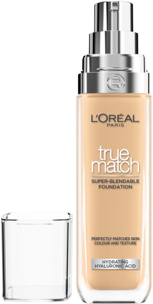 A bottle of L'Oreal True Match foundation with a pump and a glass. It is light in color and designed for skin matching.