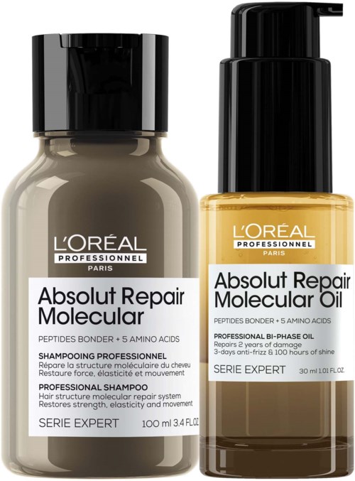 Kaksi L'Oréal hiustenhoitotuotepulloa, toinen on ammattijakso shampoo ja toinen korjausöljy.
