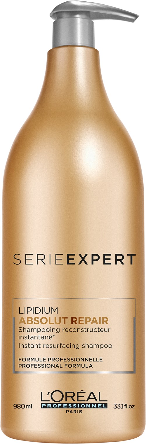 Guldfärgad flaska med pump, märkt som L'Oreal Expert Absolut Repair schampo för skadat hår.