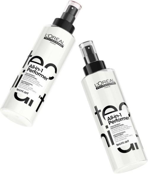 To hvite sprayflasker med svarte lokk og etiketter, merket L'Oréal Professionnel, vises. De ser ut til å være hår- eller hudpleieprodukter.