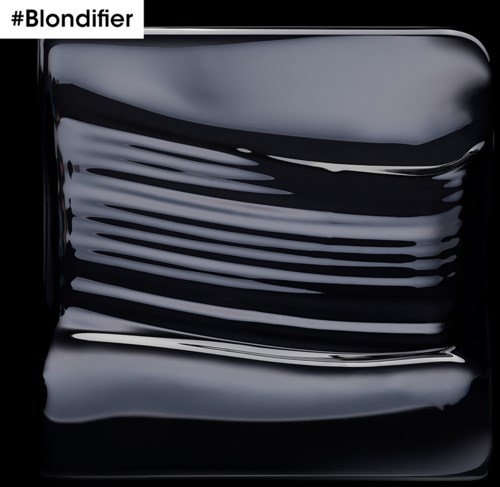 A black and white splash or streaks design, possibly a logo or artwork, with a hashtag '#Blondifier'.
