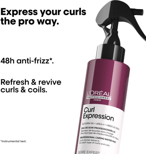 A purple bottle of L'Oreal professional curl spray for hair care, promoting curl revival and anti-frizz effects.