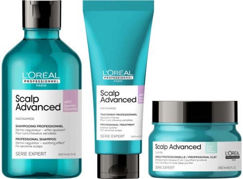 Three L'Oreal scalp care products in teal bottles and jars, labeled for professional treatment and scalp health.