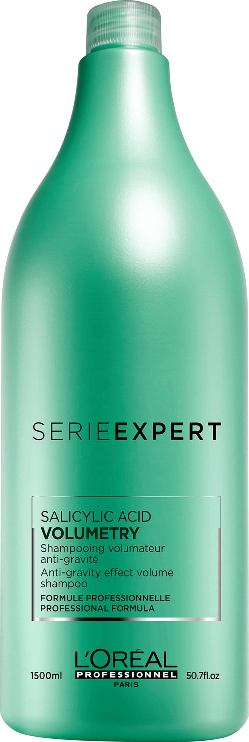 Green bottle of L'Oréal shampoo with black and green text, contains salicylic acid for volume.