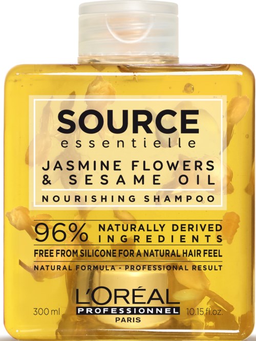 Yellow shampoo bottle contains jasmine flowers and sesame oil, labeled as nourishing with natural ingredients, 300ml size.