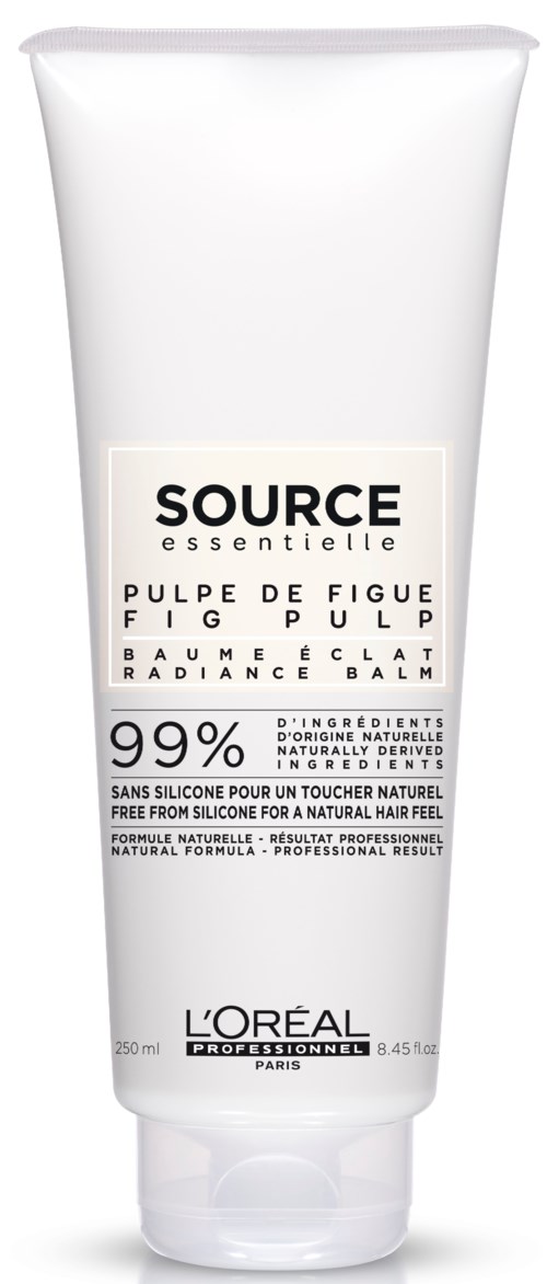 En vit tub med hårbalm märkt Source essentiel med fikonextrakt, 99% naturliga ingredienser, och L'Oreal Professionnel-etikett.