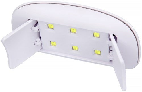 En hvit oval formet enhet med lokk på hver side og seks gule LED-lys inni.