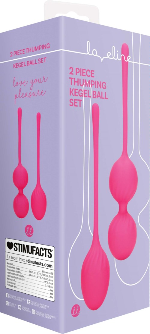 Pink two-piece kegel ball set in packaging, with string attachment and product information. Designed for pelvic exercises.