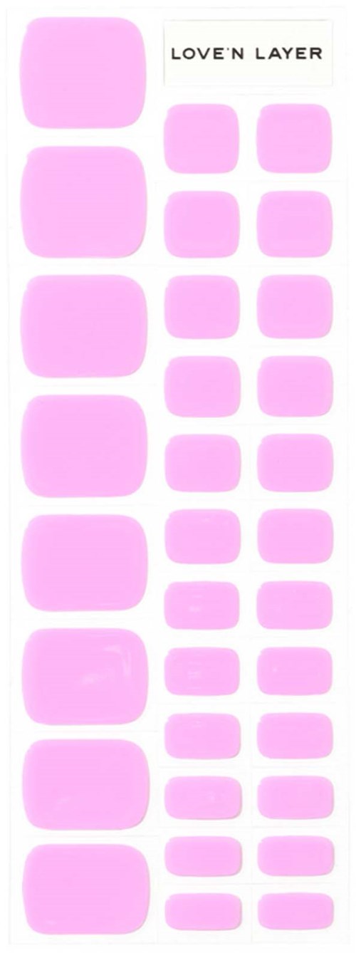 Ett ark med rosa klisterlappar i olika storlekar, märkt med 'LOVE N LAYER' högst upp.