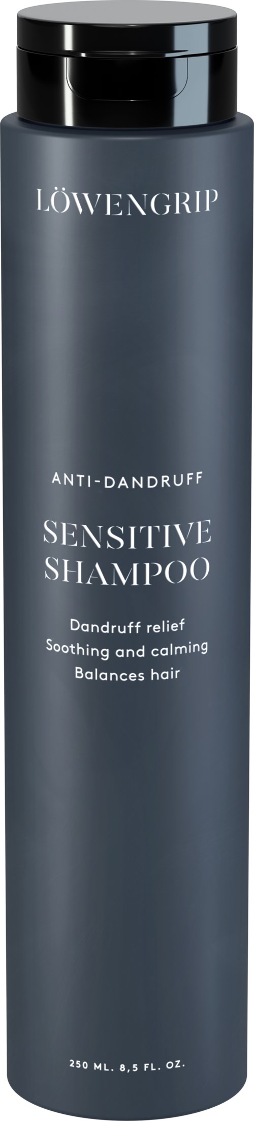 En lang, mørk blå flaske med Löwengrip Sensitive Shampoo for flasslindring, beroligende og beroligende hår. 250 ml.