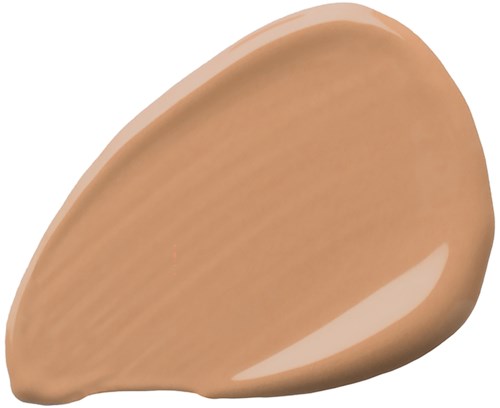 A small, smooth beige object that looks like a teardrop. It may be a shell or a stone.