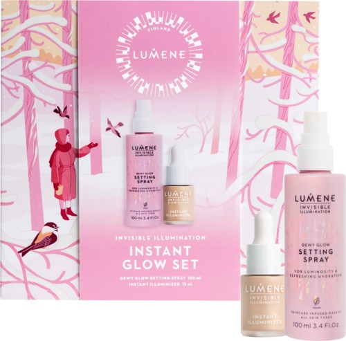 Roze advertentie voor Lumene glow-settingsprays met winterbos op de achtergrond en een meisje in winterkleding.