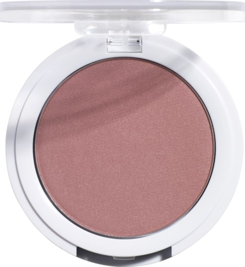 En rund makeuprouge eller ögonskugga i ett vitt kompaktfodral med en rosa nyans och en jämn yta.