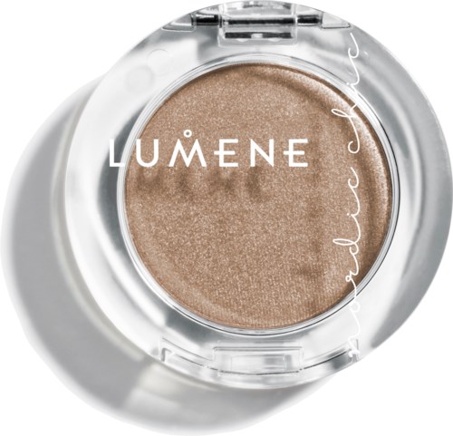 Pyöreä beige meikkituote merkinnällä 'LUMENE', läpinäkyvä kansi paljastaa kimaltelevan tekstuurin.