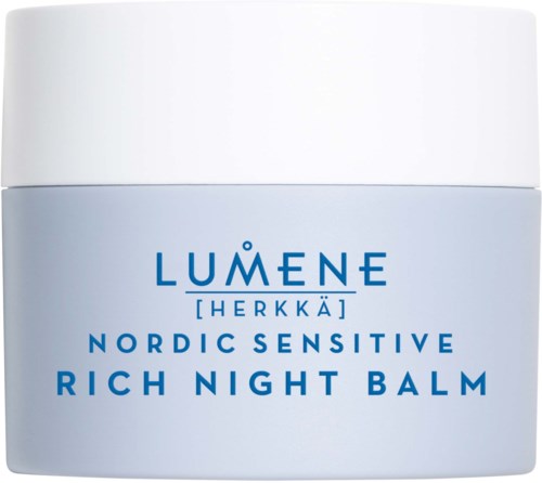 A white jar with blue text says Lumene Nordic Sensitive Rich Night Balm.