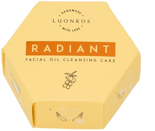 A yellow hexagonal packaging for Luonkos Radiant facial oil cleansing cake, with a berry illustration and text.