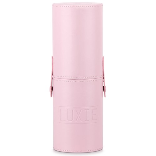 A pink cylindrical case with a strap, embossed with the name 'LUXIE', likely for holding makeup brushes.
