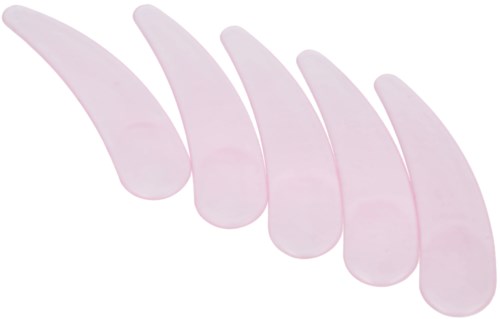 Prövade rosa ögonfransar visar flera böjda och avsmalnande stripor, används för att förbättra ögonens utseende.