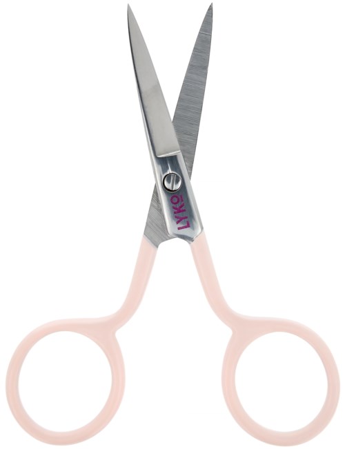 Små saxar med rosa handtag och blanka blad som korsar varandra.