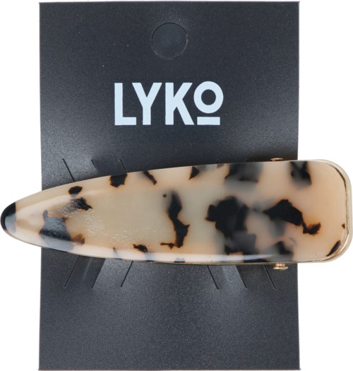 Hårklämma med en sköldpadds marginalmönster, fästad vid ett svart kort med 'LYKO' skrivet på det.