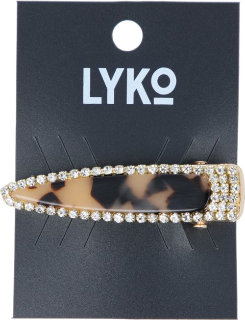En hårspänne i leopardmönster med guldkant och rhinestones på en svart bakgrund. Märket 'LYKO' finns högst upp.