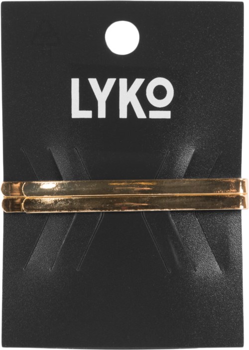 En guldig hårklämma på svart förpackning med ordet 'LYKO' i vitt.