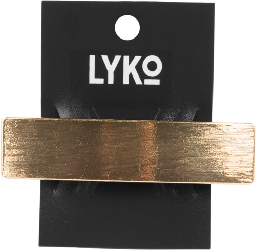 Ett guldfärgat hårspänne på ett svart kort med vitt text som säger 'LYKO'.