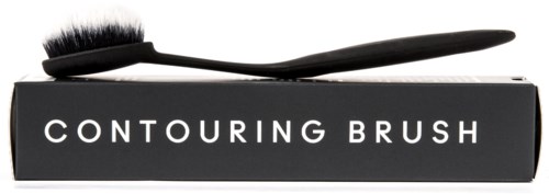 A black contouring brush rests on a box labeled "CONTOURING BRUSH" in white text.