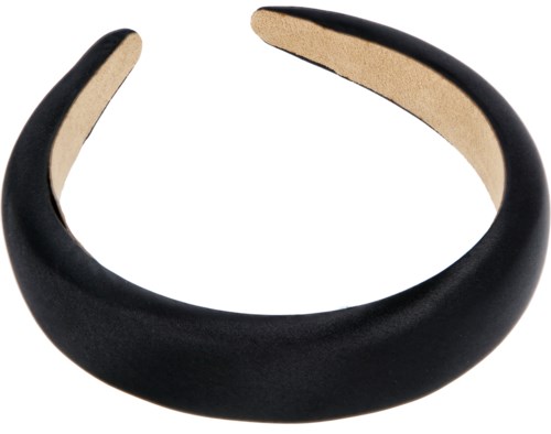 En svart, kurvad hårband med öppet bakstycke och beige innerfoder.