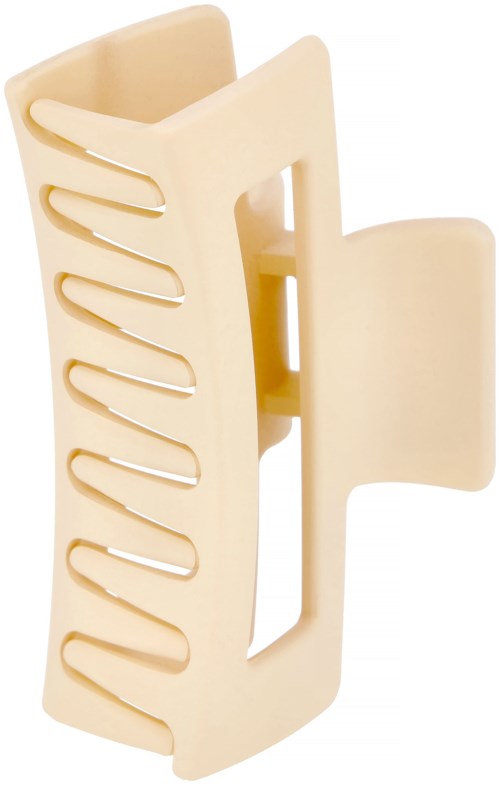 A beige plastic hair clip with a simple clip mechanism and rounded edges.