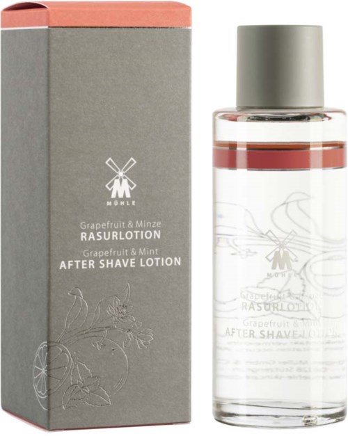 A bottle of after shave lotion with a grey box, both featuring a windmill logo and grapefruit and mint scent.