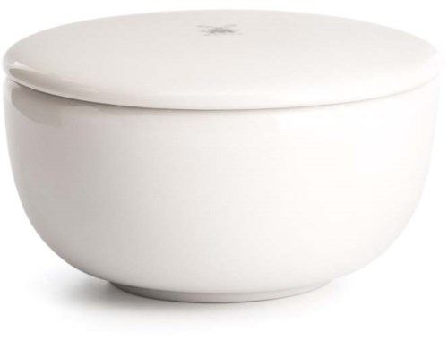 A white round container or bowl with a lid, looks sleek and modern.