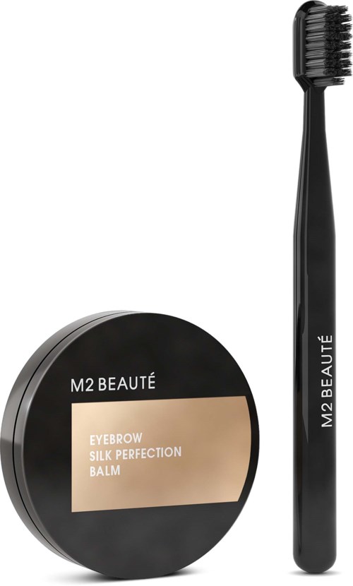 Mustara-kotelo, jossa lukee "M2 Beaute" ja "Eyebrow Silk Perfection Balm." Vieressä on musta kulmakynä.
