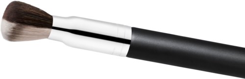 A makeup brush with a black handle and white metal part, wide brown bristles, resting horizontally.