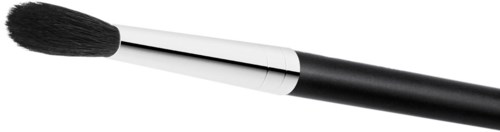 A makeup brush with a black handle and dense, fluffy black bristles, placed horizontally.