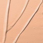 Two thin, curved lines run down a beige background, with small dots scattered around.