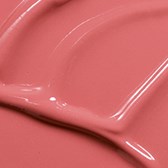 En nära bild av rosa glansig vätska eller gel med slät, reflekterande yta och flytande form.